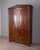 Piedmontese wardrobe, in brushed walnut wood with gable top, with two doors with lock and key, classic style, early 18th...