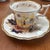 This porcelain tea cup and saucer was produced in England between 1800 and 1815. It has no mark from the manufacturer but...