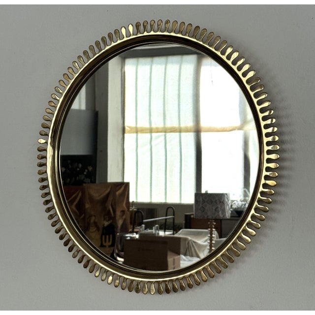 Beautiful wall mirror, made in Germany in the 1970s by excellent craftsmen of the Vereinigte Werkstätten München. The...