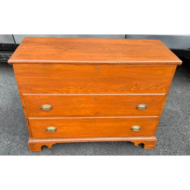 Antique 19th century pine blanket chest with 1 real drawer and 1 false drawer. The bottom drawer is the real drawer. Chest...