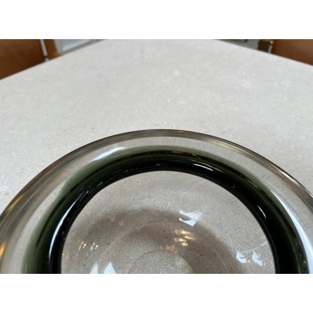 An exquisite, collectible centerpiece crafted in the 1960s on the island of Murano, Italy. This art glass bowl showcases...