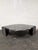 Designed and made in Italy in the 1980s, this teardrop or eye shaped coffee table sits on two fluted triangular pedestals...