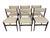 Elevate your dining space with this stunning set of six Mid-Century Danish Modern dining chairs, crafted in rich dark...