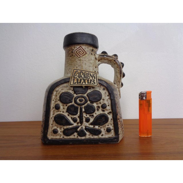 Ceramic vase by Dieter Peters for Carstens Tönnieshof. Described on the underside with C 7697-18 This piece has an...