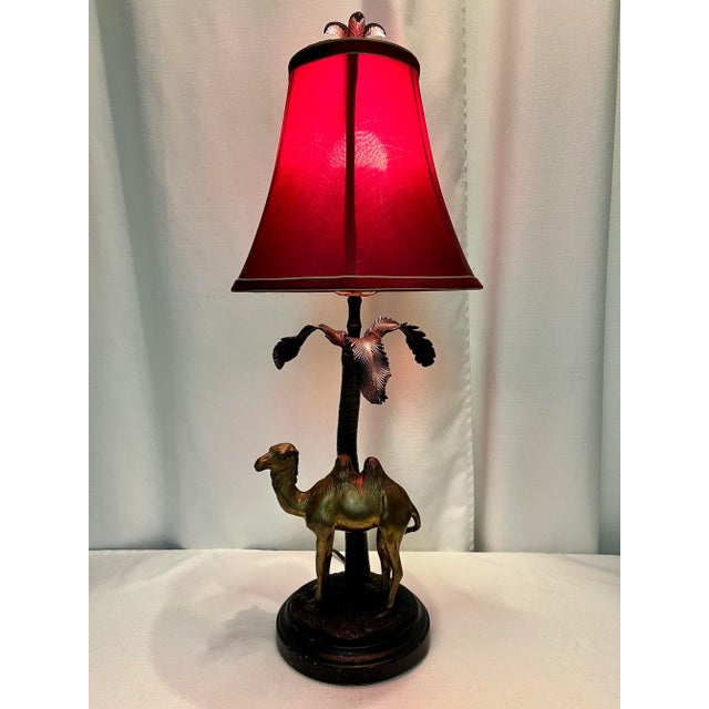Allow us to tell you all about this exquisite Vintage Maitland-Smith Style Orientalist Brass and Bronze Camel Table Lamp....