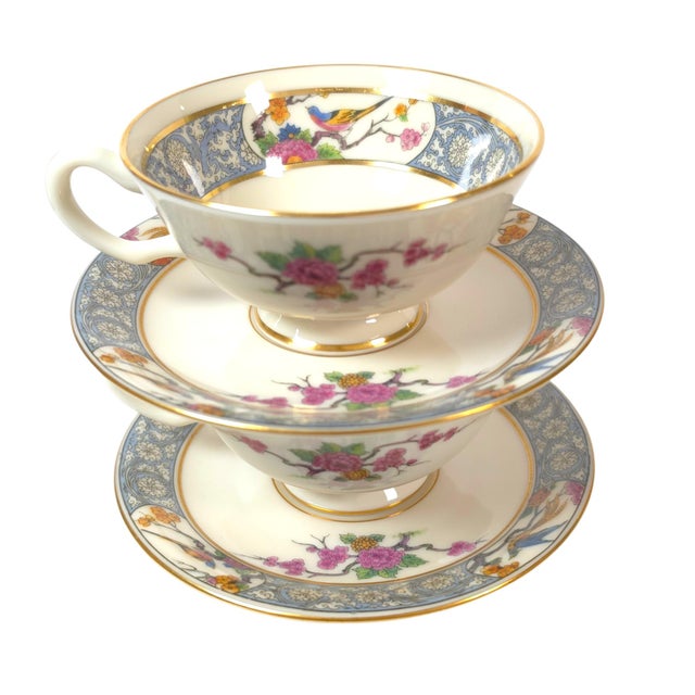 This is a vintage pair of Lenox Ming P-16 footed teacups with two matching saucers, made in the USA. Colorful birds and...