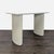 This elegant desk from Rove Concepts features a sleek white marble top and sturdy cream-colored fluted legs. The...