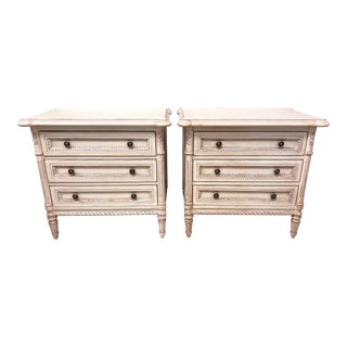 Pair of French Louis XVI Cream Carved Three Drawer Nightstands Louis J. Solomon For Sale