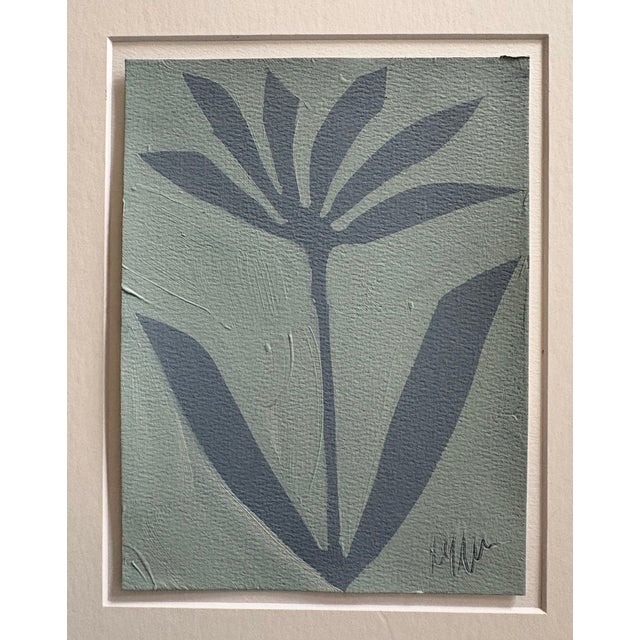 Original painting on heavy paper, signed en recto and matted by the artist, and framed under gallery acrylic (not...
