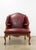 This Old Hickory chair and matching ottoman feature an elegant traditional silhouette with richly carved wood detailing,...
