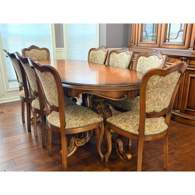 This spectacular Italian Provincial Baroque-style marquetry dining room table and 8 matching chairs will elevate any...