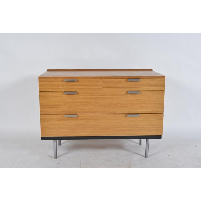 A beautifully proportioned chest of four drawers from the iconic stag fineline range, designed by john and sylvia reid and...