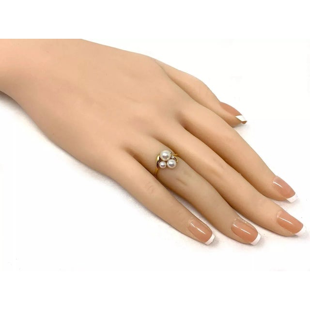 Material: 18k yellow gold Hallmark: M K18 Measurement: top: 11.5mm across x 10.8mm wide x 7mm high Ring Size: 3.5 Diamond:...