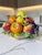 Bring the vibrant warmth of the Mediterranean into your home with this stunning vintage Italian Majolica ceramic fruit...