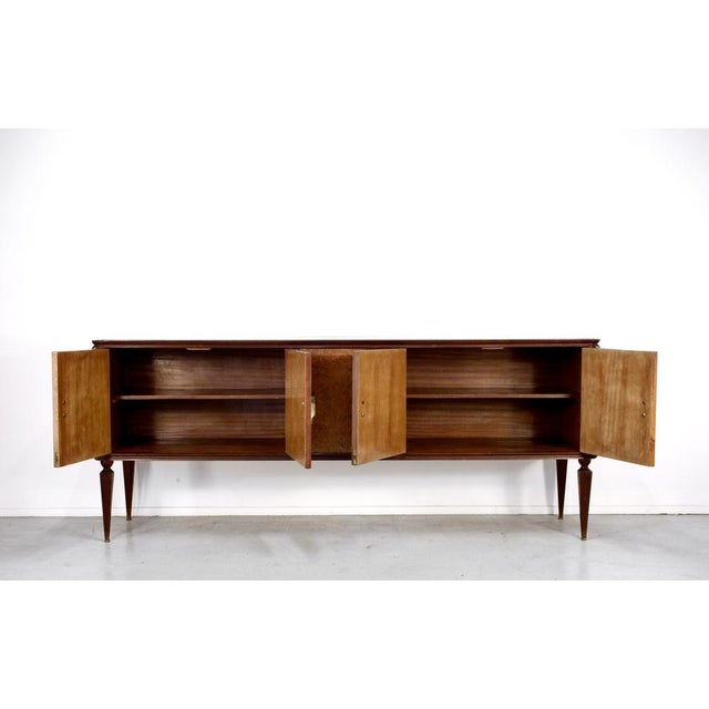 Mid-Century Italian Walnut and Brass Sideboard, 1950s, in Very Good conditions. Designed 1950 to 1959