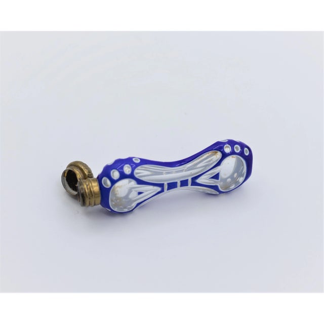 Bohemian Crystal box and perfume bottle, overlay glass, cut, in two layers of blue and white, Period: 1900 Measures: 11.5...