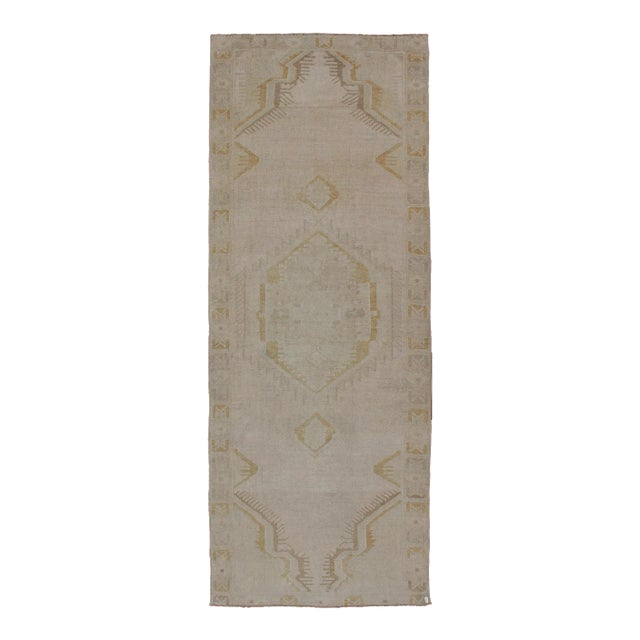 Light Colored Vintage Oushak Runner With Geometric Medallion in Taupe Color and Golden Color For Sale