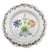 This hand-painted faience plate reflects the provincial ceramic traditions of nineteenth-century France. Formed in a...