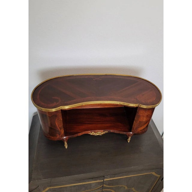 A stunning, rare fine quality French gilt bronze mounted Kingwood marquetry bibus (miniature bibliothèque). In the manner...