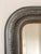 Antique French Louis Philippe mirror, dating to the late 19th century. The mirror features a grey-painted frame with a...