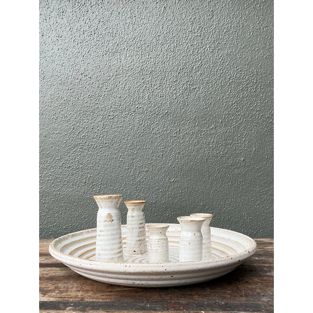 This unique vintage studio pottery centerpiece is a masterclass in organic form and functional art. Hand-thrown with a...