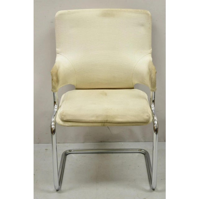 Vintage Mid Century Modern Milo Baughman Style Tubular Chrome Fabric Upholstered Arm Chair. Circa Late 20th Century....