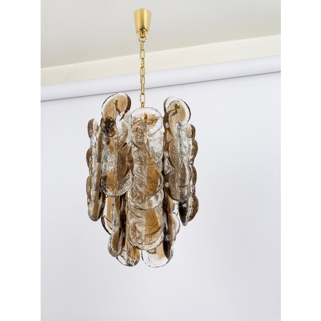 Murano glass chandelier by kalmar, 1970s. Smoked swirl ice glass, clear twisted crystal glass panels with a light goldish...