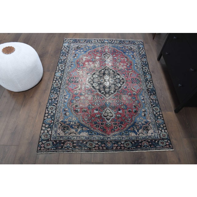 Vintage Persian Hand-Knotted red area rug is a semi-antique vintage area rug. The '70s Eastern region of Anatolian's...