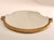 This golden French Art Deco mirror with ornaments was produced in the 1930s. All parts original, mirror and frame show...