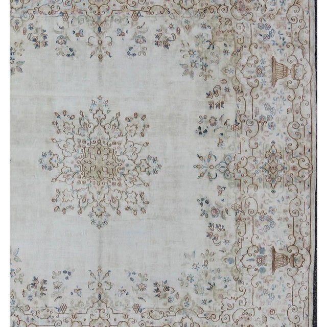 1920s Antique Persian Kerman Rug Featuring Central Medallion and Delicate Botanical Motifs 6′10″ × 7′1″ For Sale - Image 5 of 6
