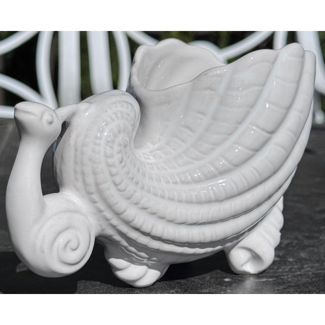 Made in Portugal and full of personality, allow this busy vintage snail to hold your floral arrangement, centerpiece or...