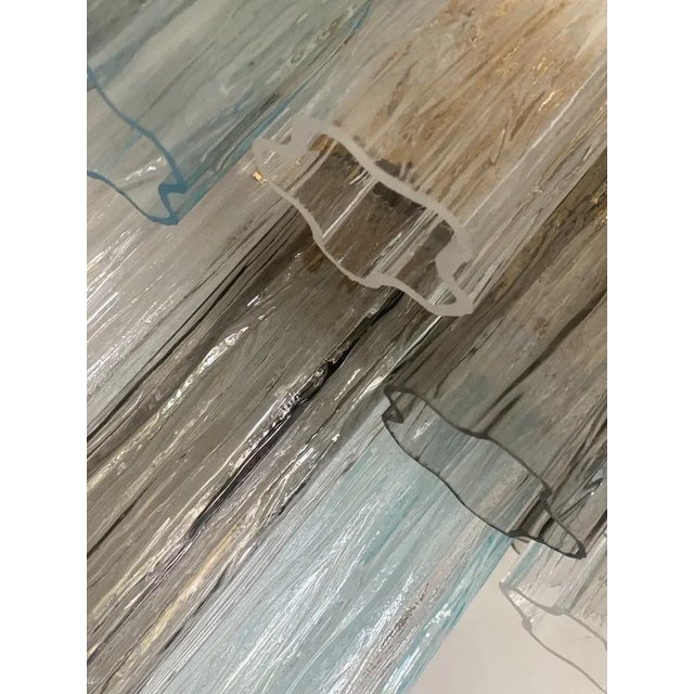 A pair of 2 murano glass "murano glass "tronchi" wall sconces spare parts included. 2 bulbs. murano glass "tronchi" wall...