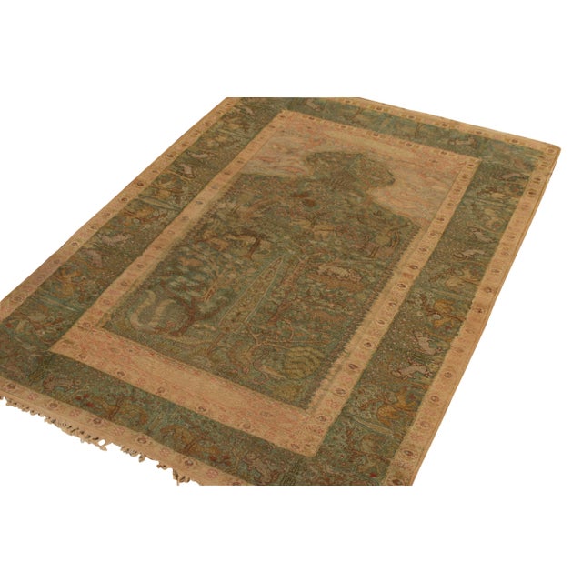 Hand knotted in a rare metallic thread with silk and originating from Turkey circa 1920-1930, this antique 4x6 Kayseri rug...