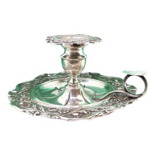 Silver Paddle with Revealed Floral Motifs For Sale