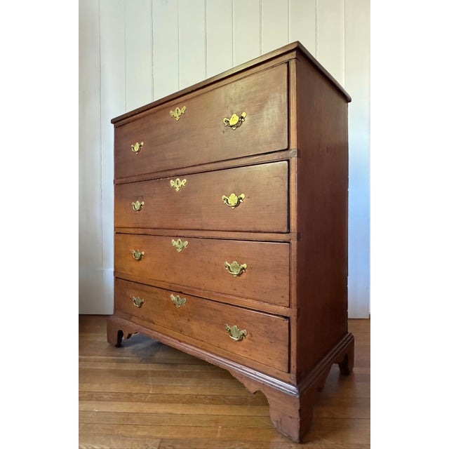 Early American Pennsylvania pine chest with graduated drawers and brass hardware with beautiful natural patina