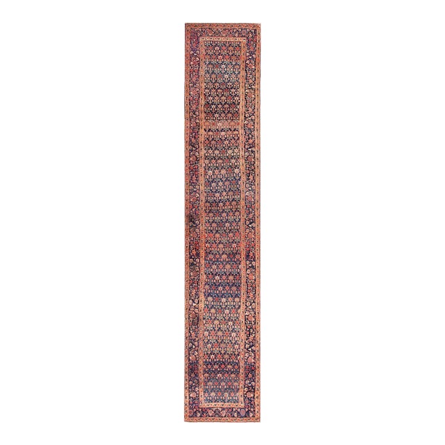 Traditional Allover-Floral Design in a Navy Background Color Antique Persian Bijar Runner Rug For Sale