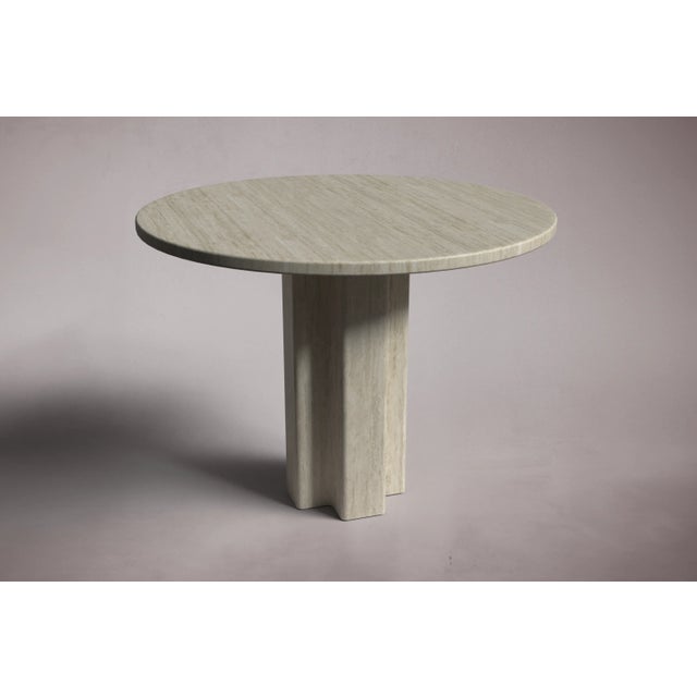 Crafted and hand-finished from Travertine. Travertine can be honed and polished for a matte finish that enhances the...