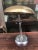 Elegant chrome ministerial lamp, designed by the Italian architect Giovanni Michelucci and made of chromed metal and brass...
