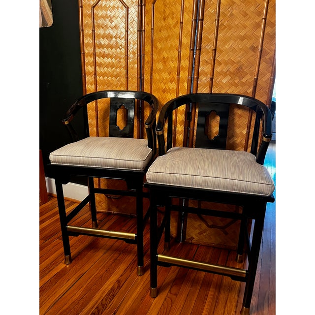 A pair of black lacquer Century brand James Mont bar stools. Chinoiserie / Ming style that is always a classic. No makers...