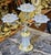 This ornate brass and crystal decorative holder is designed to hold up to three candles, creating a balanced and elegant...