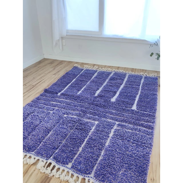 One-of-a-kind handwoven Beni Ourain rug from Morocco. Pure cobalt and royal blue from end to end, with white lines tracing...