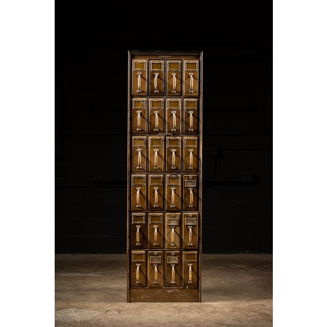 c. 1920s; Art Metal Construction Co., Jamestown, NY. Oversize freestanding steel file cabinet with 24 keyed drawers. This...