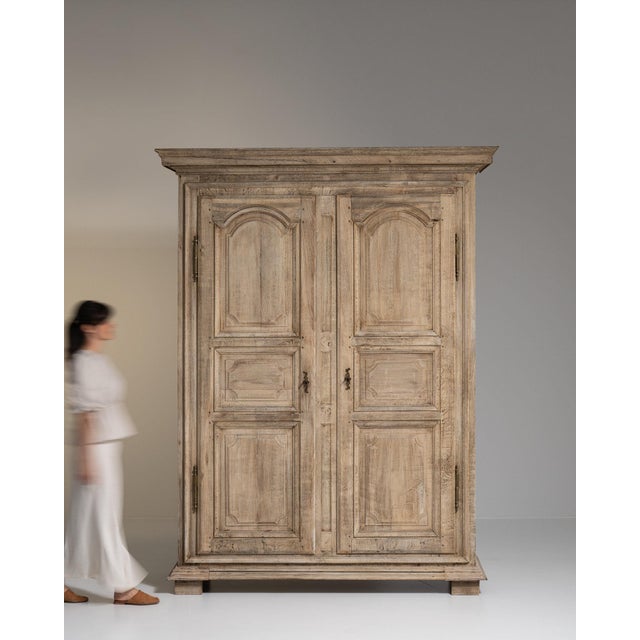 Painted oak bookcase cabinet in Weathered Pale Grey. Finished in weathered pale grey, this painted oak bookcase cabinet is...
