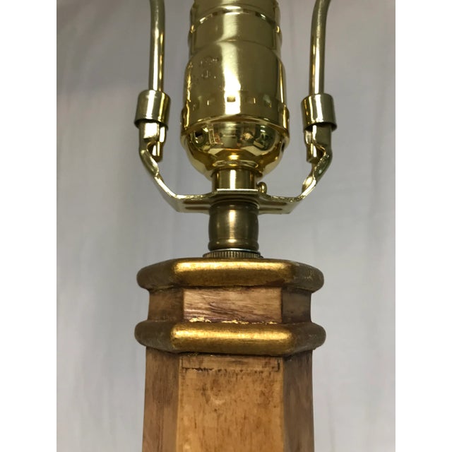 20th Century floor lamp made of elm with gilt accents. Stylish, one of a kind look placed by a lounge chair. Looks great...