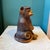 A wonderfully charming carved resin monkey statue. C.1970's. Dimensions: 5.75"W x 7.5"D x 10"H