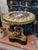 Description: This exquisite round table is a stunning example of fine European craftsmanship, likely dating from the 19th...