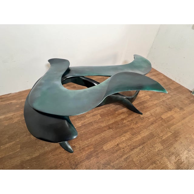 Studio craft freeform coffee table of carved wood in aquamarine lacquer signed Walsh, 1989 and titled Nui Nalu No. 1...
