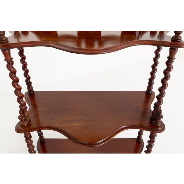Pair of victorian whatnots or bookshelves in mahogany These whatnots stand upon shaped feet Circa 1870 Each whatnot...