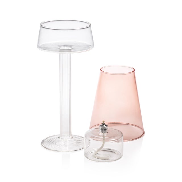 The Dauphine Glass Table Lamp merges function with artistic craftsmanship, featuring a sleek glass silhouette that houses...