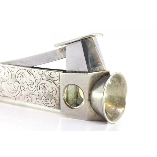 Silver Plated Cigar Cutter with Engraved Wreaths and Steel Interior, in Very Good conditions. Designed from 2000 This...